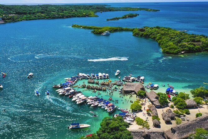 5 Stop Boat Tour Rosario Islands with Lunch, Forts, & Snorkeling - Final stops on the Rosario Islands: resort calm or Cholon festival energy