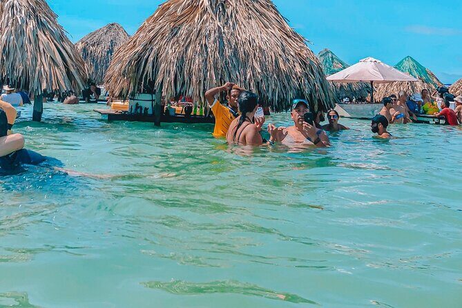 Cartagena: Full Day Guided Tour to Cholon Island - Four hours on Cholón: music, lunch timing, and the no-chair reality