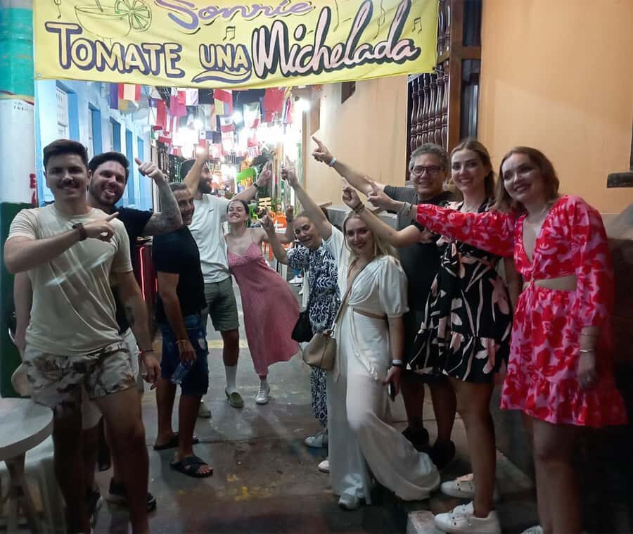 Cartagena: Historic Center and Getsemaní Shared Walking Tour - Plaza de la Aduana, municipal buildings, and the trade behind the walls