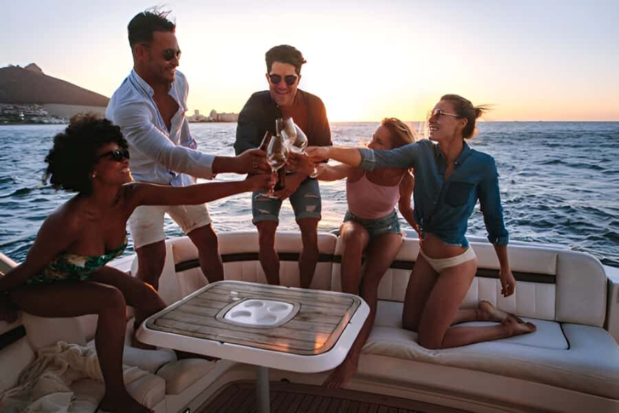 Cartagena: Party Boat to Cholon Beach with 2 Drinks & Lunch - Getting There: Pickup Options, Clock Tower Meeting, and Pier Drop-Off