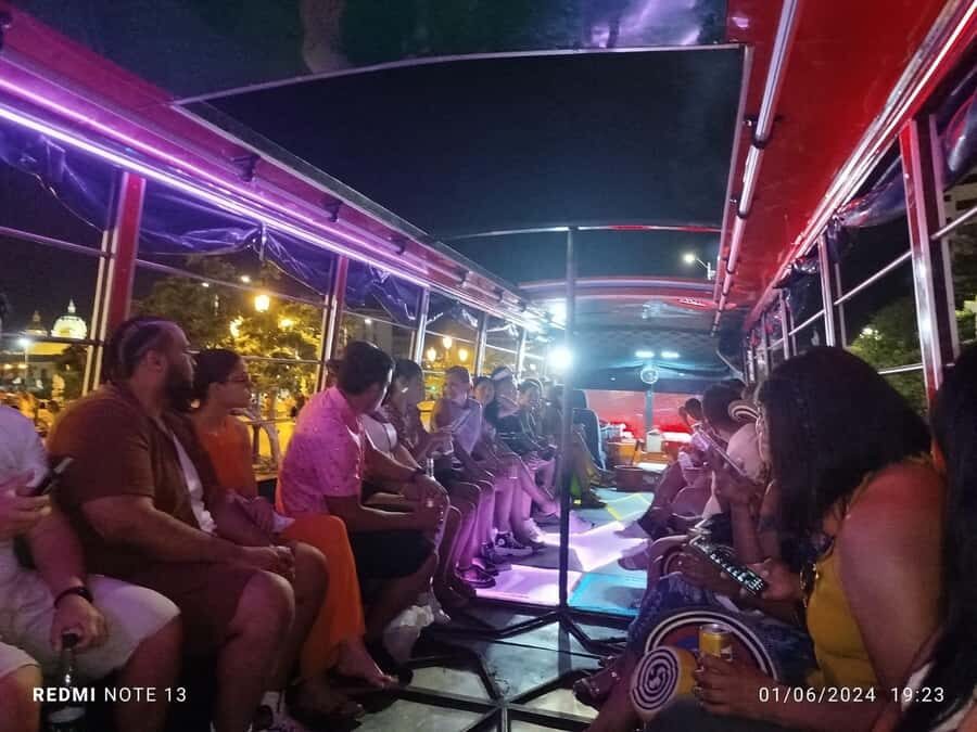 Cartagena: Party on a typical bus crossing the city - Passing the Castillo de Sanfelipe area and the city walls