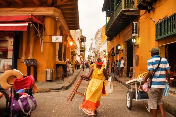Cartagena Sightseeing Tour Historic Center starting at the port - The Walled City walk: Torre del Reloj, slave-trade history, and key churches