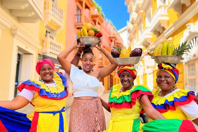 Cartagena Sunset Walking Tour - Camellón de los Mártires: the Clock Tower Gate and the price of rebellion