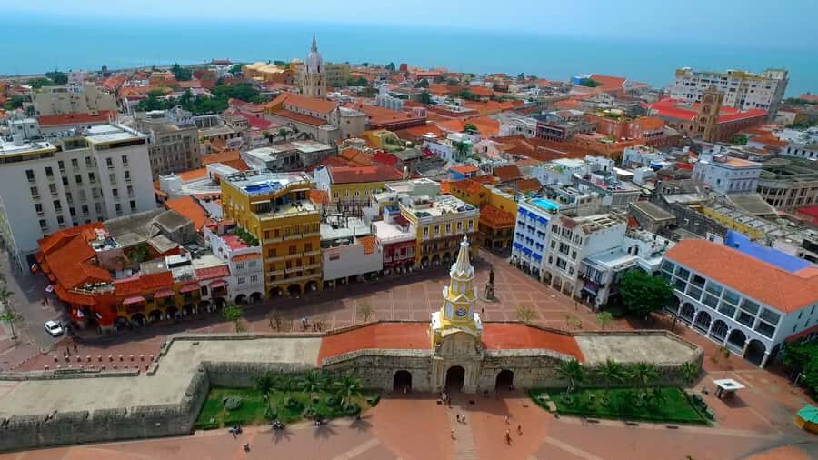 Cartagena: Walled City and Getsemani Shared Walking Tour - Walled City highlights: Santo Domingo, the cathedral, and the plazas that explain Cartagena