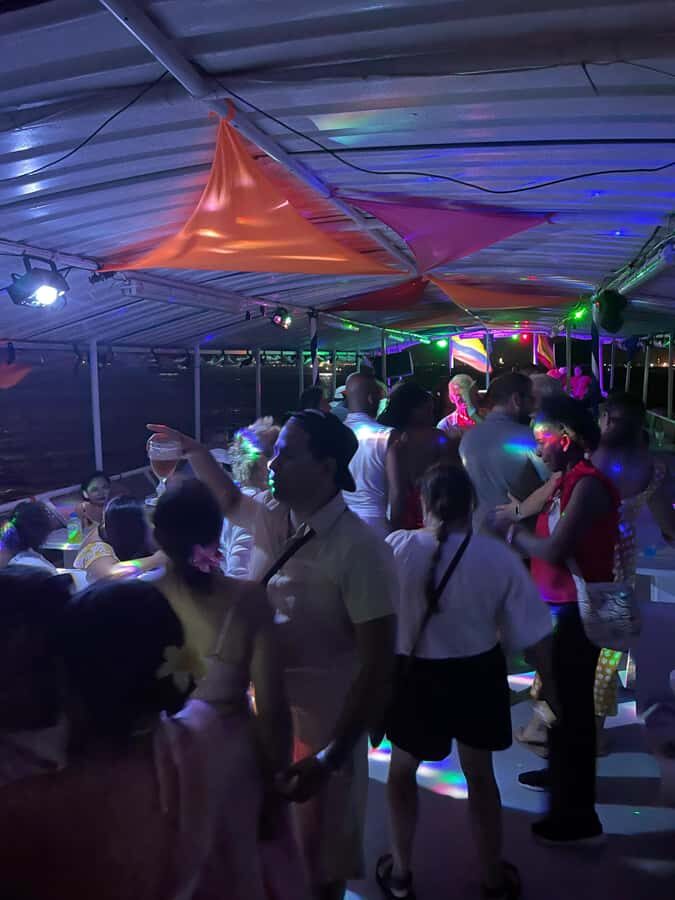 Cartagena: White Night Boat Tour with Dinner and Open Bar - The party setup: welcome cocktail, live DJ, and dancers who bring the show