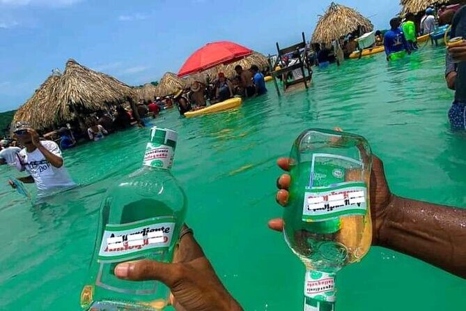 Cholon The party island, with DJ on board - Lunch, Two National Beers, and the Extras You’ll Want to Budget