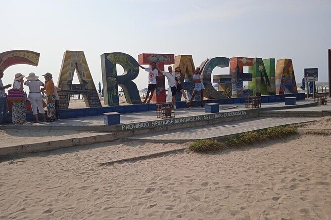 Full BILINGUAL CITYTOUR, Castle Entrance and Monuments - Letras de Cartagena on Marbella beach: your colorful, low-effort break