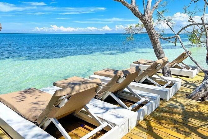 Full Day Private Beach Club Palma Island and Full Food - Costs that can surprise you: pier fees, towels, and on-island snacks