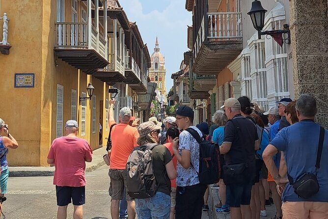 Historical Tour of Cartagena - Proclamación and Roma Street: government details and balcony-level views (Plaza de la Proclamación and Calle Carulla Express/Roma)