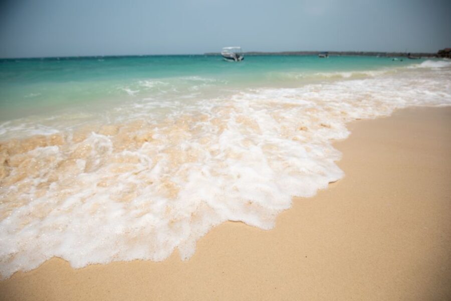 Playa Blanca Full-Day Trip from Cartagena - Crossing Campo Elias Teran Bridge to reach the island of Baru