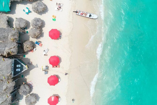 Playa Blanca in Baru Island - Your Swim Day: Water Conditions, Boats Close to Shore, and Wind Later On