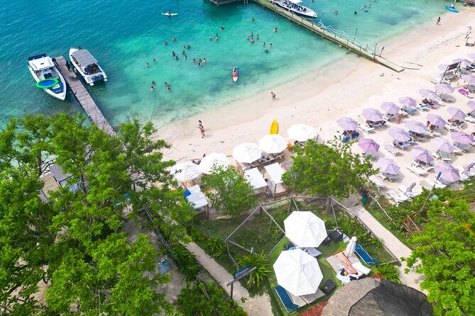 Rosario Beach Cartagena Full Day with Snorkeling - Your arrival ritual: cherry lemonade and beach-club comfort