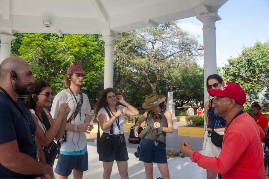Shared Cartagena Old City Tour with Wireless Audio System - Plaza de los Coches and Plaza de la Aduana: trade, commerce, and power