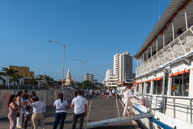 Sunset in Cartagena Bay with Boat Dances and Bar - The Muelle de la Bodeguita meet-up and what the boat experience feels like