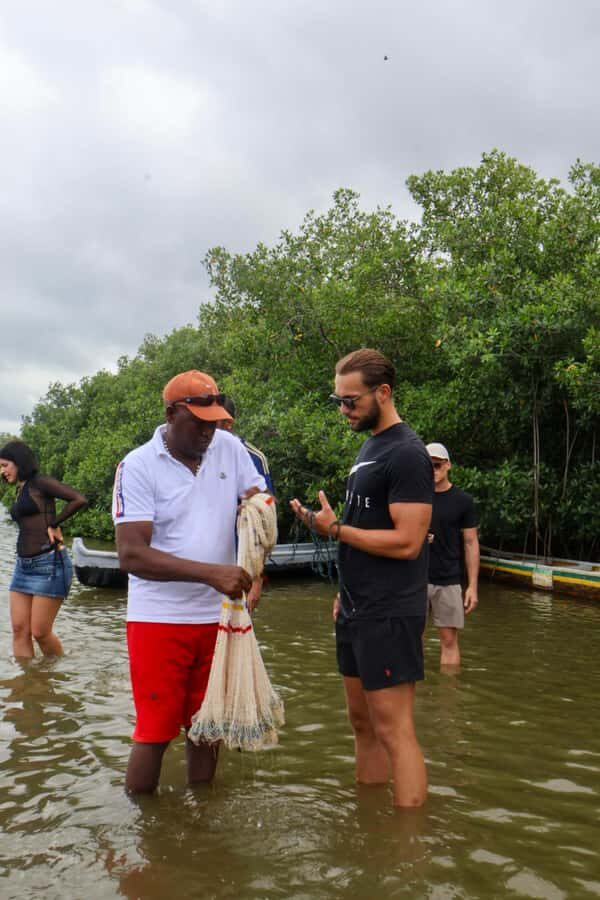 Typical lunch on beach, mangrove tour & fishing with natives - Coconut welcome and mangrove canoe time